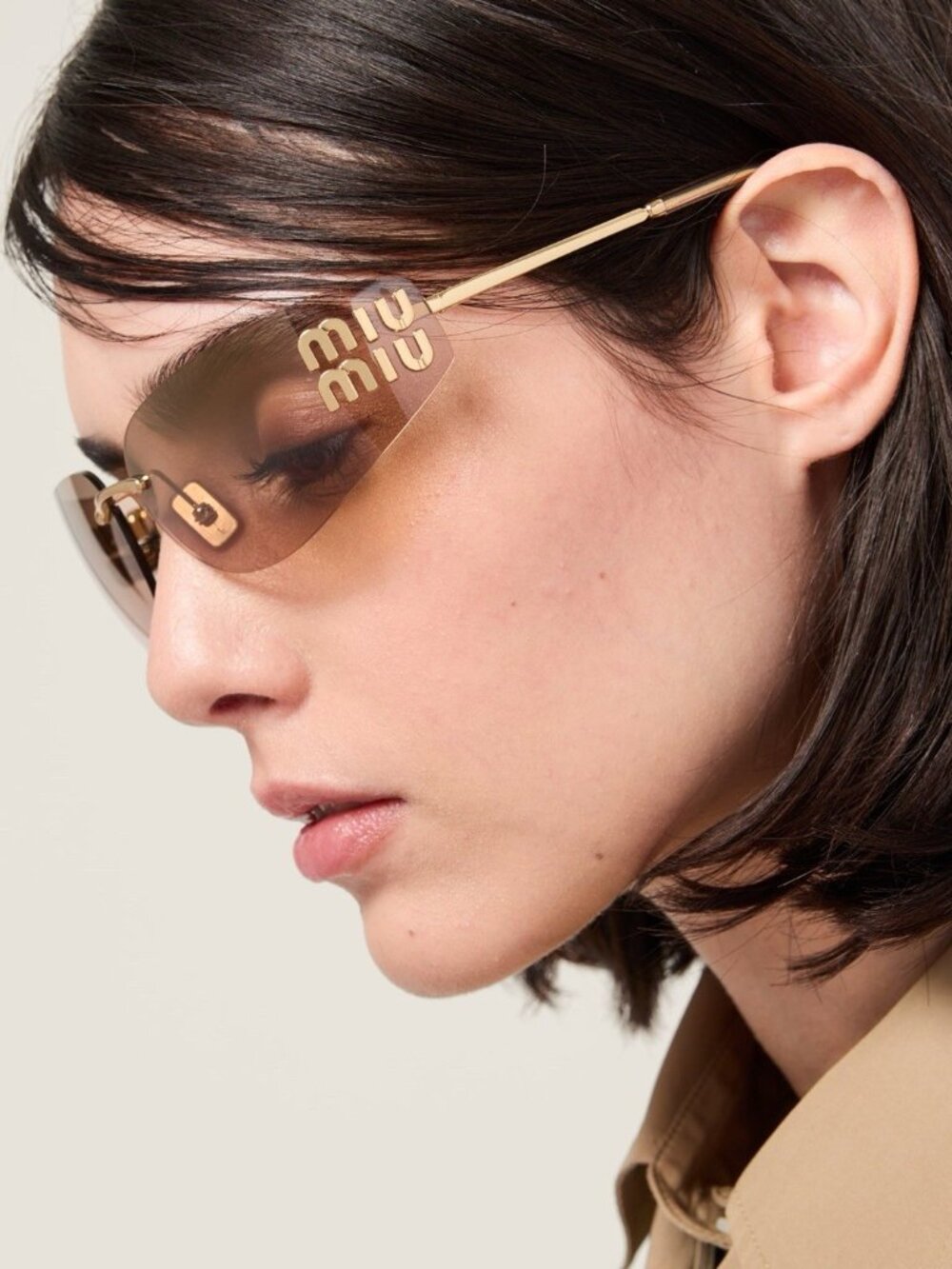Miu Miu Rectangular Sunglasses in Gold